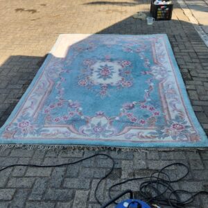 A carpet in the cleaning process